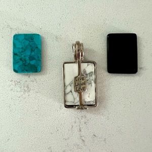Silpada pendant in sterling silver with 3 interchangeable inserts.